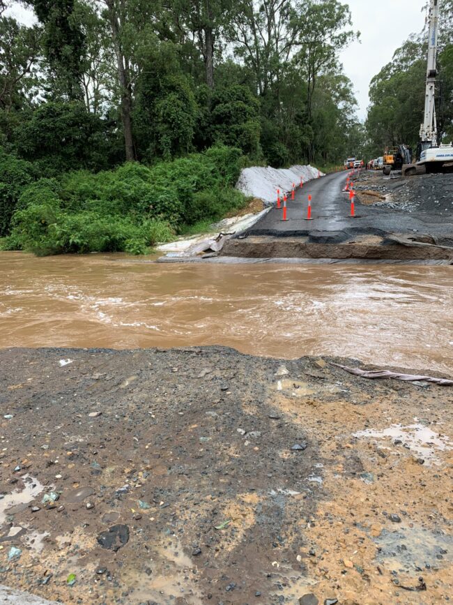 flying Fox road washed away with the creek flowing fast across what was the causeway for the road.