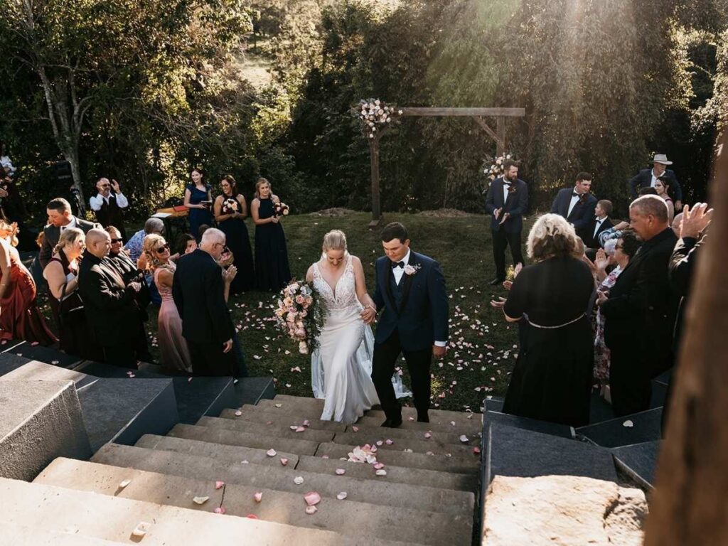 Surrounded by trees, mountains, and the people who matter most, their vows unfolded in our natural amphitheatre. A quiet gathering, a shared breath, and a moment that felt timeless, simple, and deeply real.